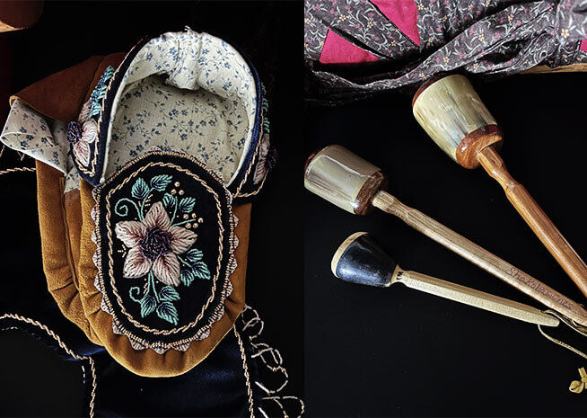 A close-up of an intricately embroidered traditional vest and shoes, accompanied by ceremonial wooden mallets on a dark background.