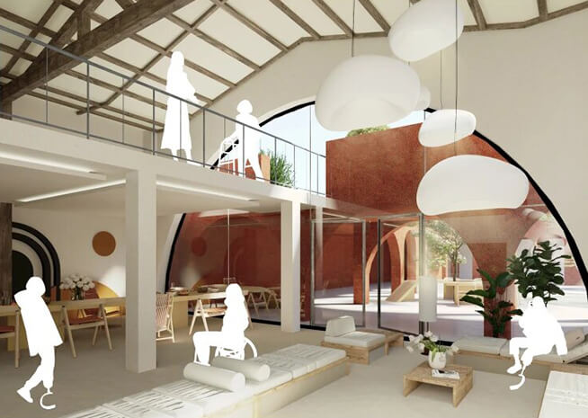 Interior espacioso y aireado de planta abierta con muebles blancos, grandes lámparas colgantes y un altillo con pared de acento color terracota.