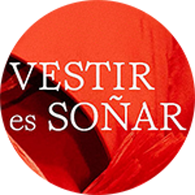 A logo featuring stylized white text "VESTIR es SOÑAR" on a vibrant red background with a crumpled texture.